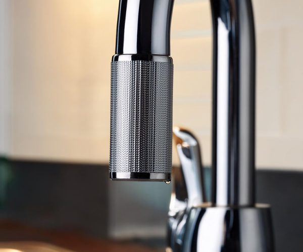 Firefly A closeup photo of a kitchen faucet 44610